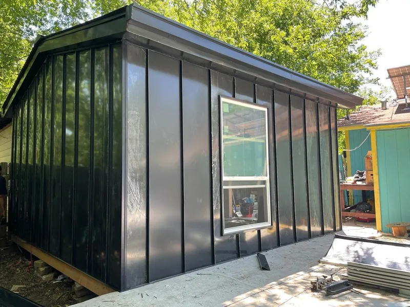 Black standing seam metal wall panels for Metal Roof Installation in Doraville